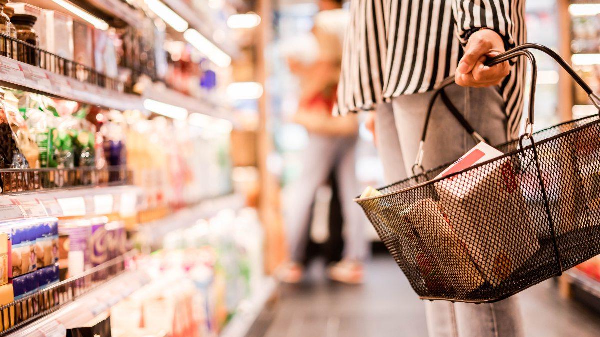 Women choosing products in a supermarket.